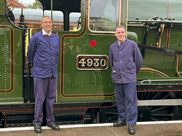 Driver Duncan Ballard and fireman Andy Sweet pose by the new number plate, photo Loretta Milan